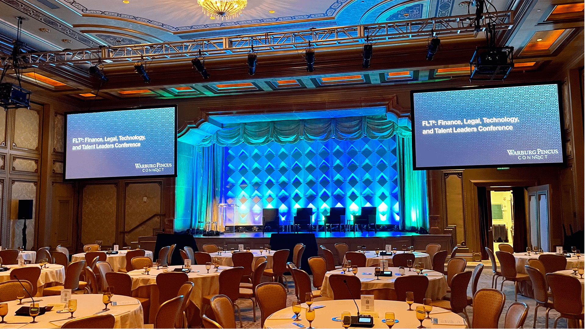 Two projector screen set up for a general session